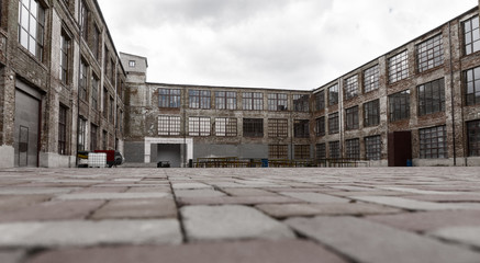 Ground level view of old warehouse exterior