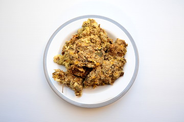 Dried chrysanthemum flowers in dish