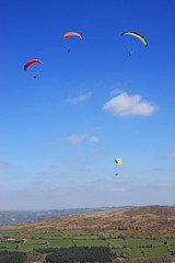 paragliders above Dartmoor
