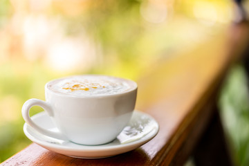 coffee cup on wooden table ,soft focus