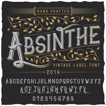 Absinthe label font and sample label design with decoration and ribbon. Vintage font. Whiskey font. Fine label font. Handcrafted font. Decoration font. Font style. Retro font. Old font