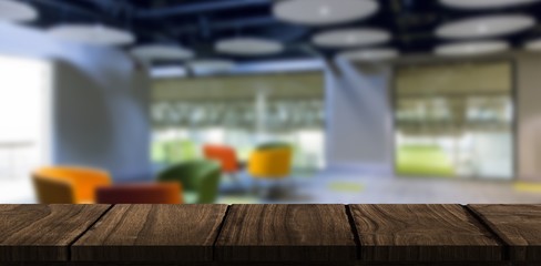 Composite image of wooden desk