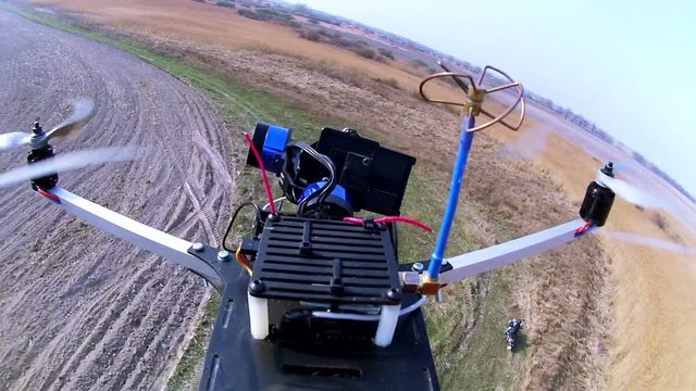 
Drone, copter  films   motorcycle  team on  rural  road through camera with gimbal.
