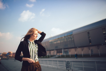 stylish blonde lady  posing for the camera