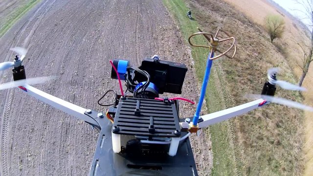 
Drone, copter  films   motorcycle  team on  rural  road through camera with gimbal.
