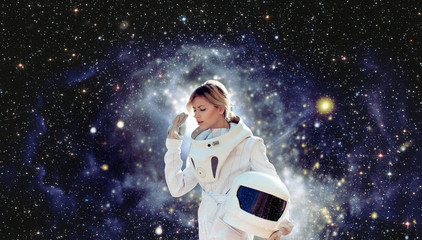 futuristic astronaut without  helmet,  space backgrounds. Elements of this image furnished by NASA.