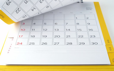 desk calendar with date of april 2016 in grid and line for notes, turn page