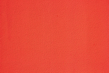 Fototapeta premium Plaster texture wall. Exterior red stucco.