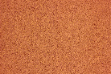 Plaster texture wall. Exterior brown stucco.