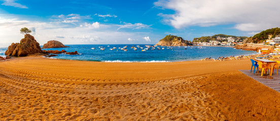 Sand beach Platja Mar Menuda, Badia de Tossa bay and fortress Vila Vella in the morning, Tossa de...