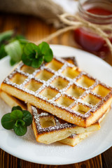 baked cheese waffles with powdered sugar