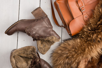 Women's set - a fur coat, warm boots and  bag