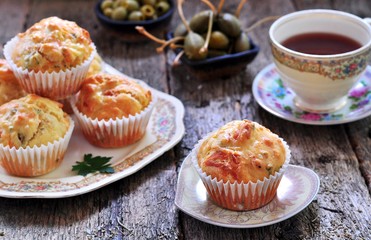 snack cakes with cheese, ham, olives and sun-dried tomatoes