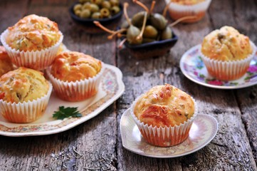 snack cakes with cheese, ham, olives and sun-dried tomatoes