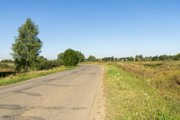 Fototapeta na wymiar Cracked Rural Road
