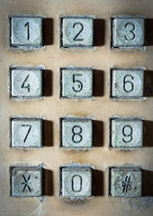 Old button number public telephone, Close up image