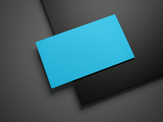 Blue business card on a black folder