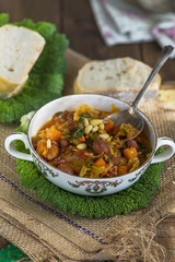Savoy cabbage stew with carrot and borlotti beans