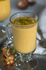 Yogurt dessert with mango and passion fruit