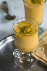 Yogurt dessert with mango and passion fruit