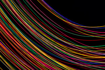 Neon lights in motion. Abstract colorful shiny background.