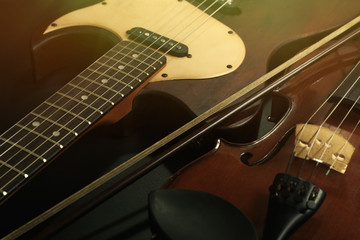 Naklejka na ściany i meble Electric guitar and violin, close-up