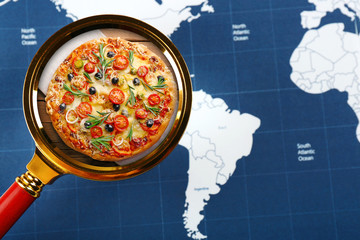 Popular food concept. Looking for pizza on world map