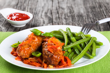 Delicious Meat Cutlets stewed with tomato sauce