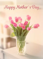 Fresh bouquet of tulips in kitchen