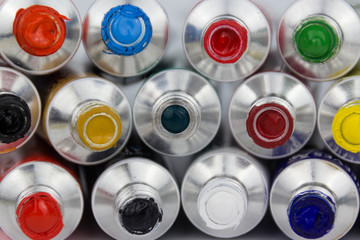 many colorful paint tubes closeup