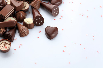 Assorted chocolate candies, isolated on white