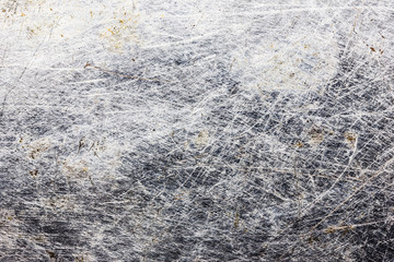 Grunge rusty scratched metal surface.