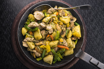 fried potatoes with vegetables