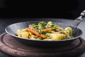fried potatoes with vegetables