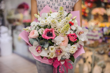 Rich bunch of white and pink flowers in hands