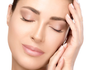 Closeup young woman face with serene expression. Spa Beauty Concept