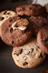 Chocolate chip cookies on wooden background
