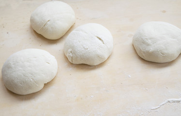 Fototapeta na wymiar dough balls to make pizza
