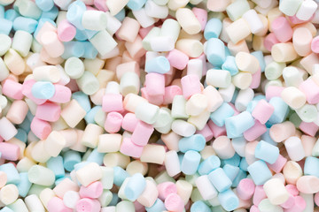 Background or texture of colorful mini marshmallows.
