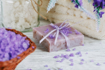 Fototapeta na wymiar Natural handmade soap, sea salt and towel