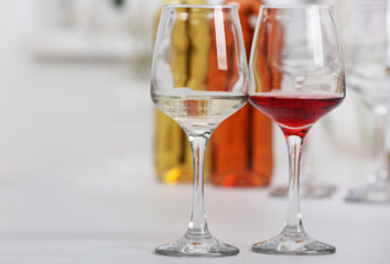 Wine glasses with red and white wine, closeup