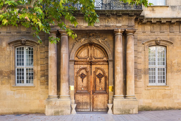 Wooden door on an old building in Aix-en-provence, France