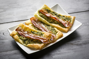 sandwich with puff pastry with bacon and spinach