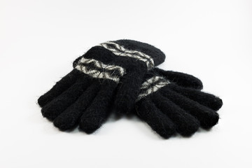 Black wool gloves isolated on white background