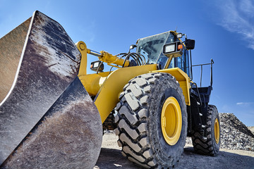 Heavy equipment machine wheel loader on construction jobsite