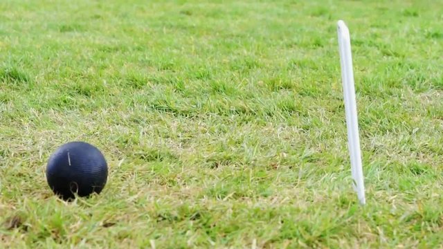Hitting a croquet ball