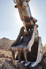 Construction heavy equipment excavator thumb grappler bucket © 1jaimages