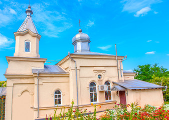 Orthodox church and garden of flowers