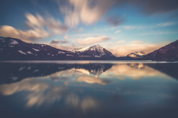 Morning glory - Beautiful sunrise ober the lake thun in Switzerland - obrazy, fototapety, plakaty