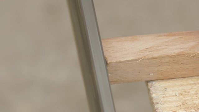 polishing of wooden plank using a rasp